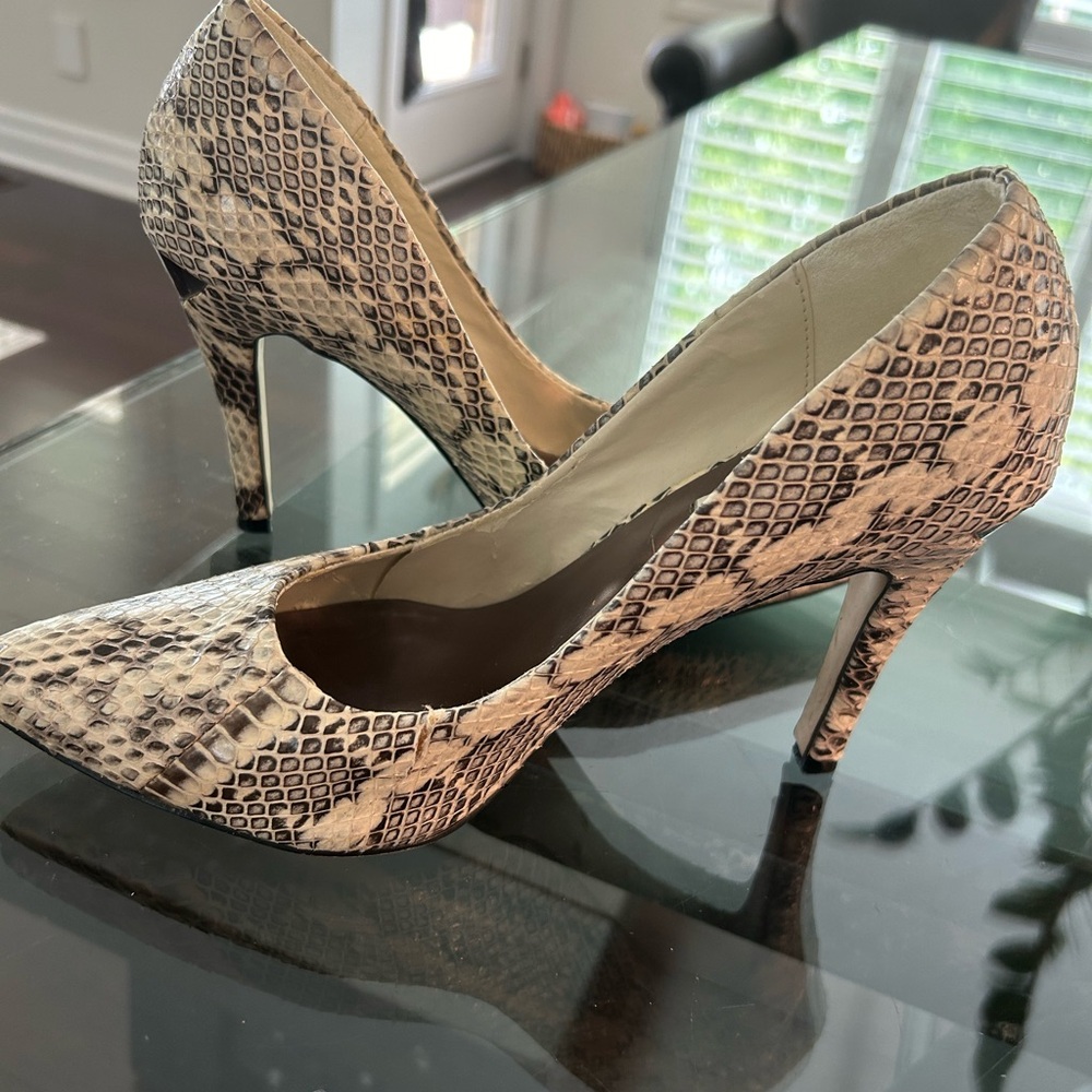 Cream and black snake skin 3” heel. Great condition.